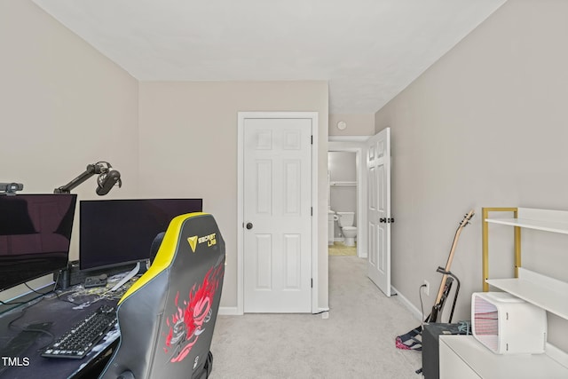 office area with carpet flooring and baseboards