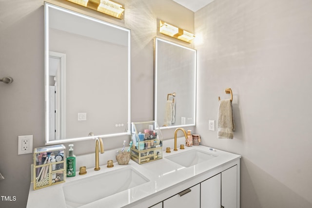 full bath featuring a sink and double vanity