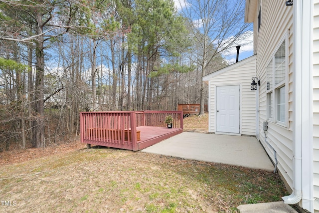 view of yard with a wooden deck