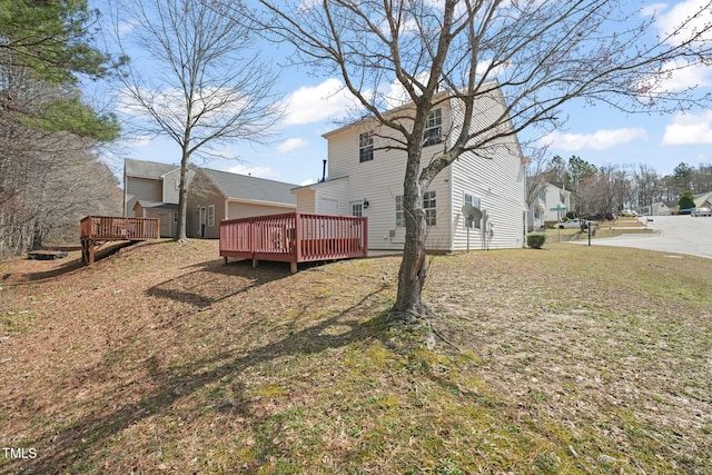 view of yard with a deck