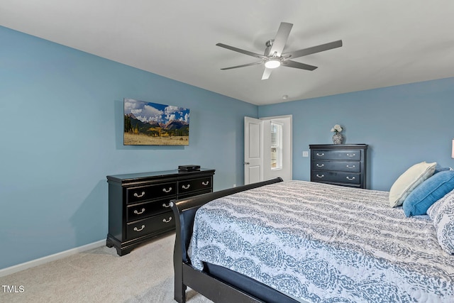 bedroom with baseboards, light carpet, and ceiling fan