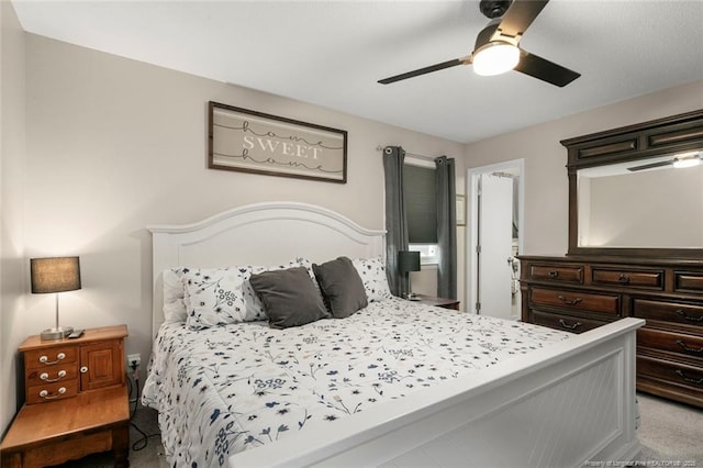 bedroom featuring carpet and a ceiling fan