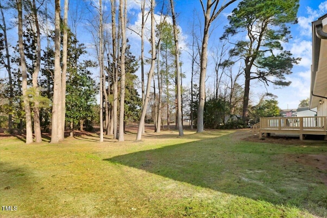 view of yard with a deck