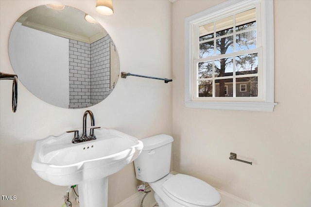 bathroom with a sink and toilet