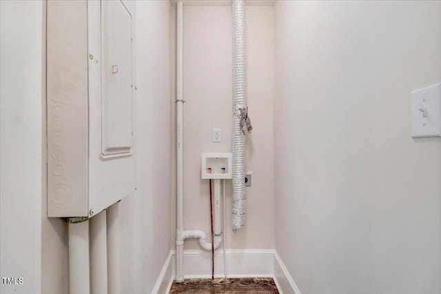 washroom featuring baseboards, washer hookup, and hookup for an electric dryer