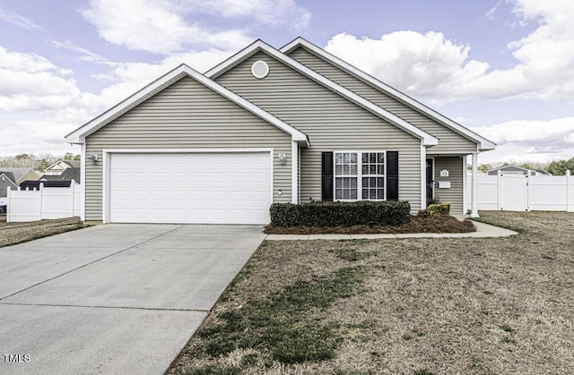 ranch-style home with a garage, concrete driveway, fence, and a front lawn