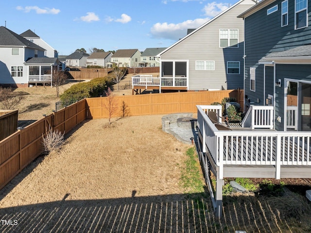 view of yard with a residential view and a fenced backyard