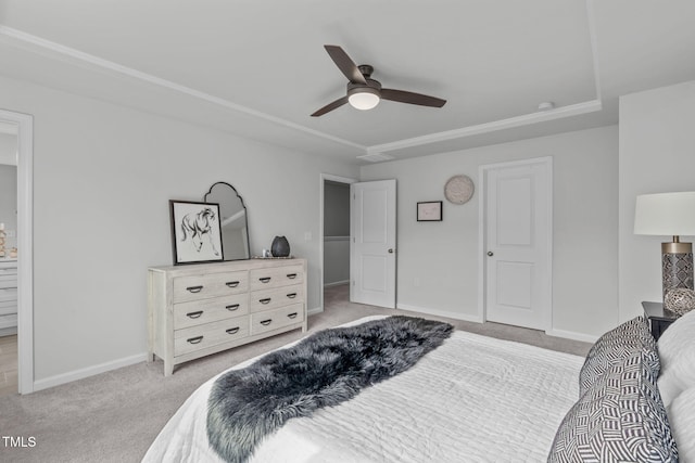 carpeted bedroom featuring ceiling fan and baseboards