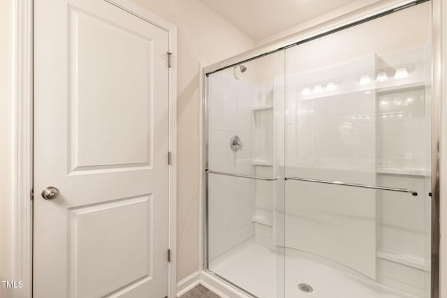 bathroom with a stall shower