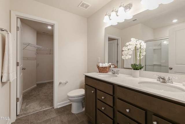 full bathroom featuring visible vents, a sink, and toilet