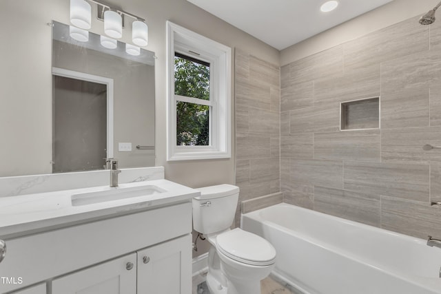 bathroom featuring shower / tub combination, vanity, and toilet