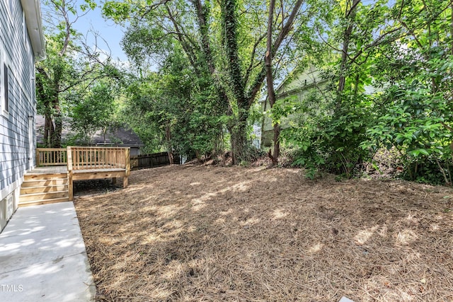 view of yard with a deck