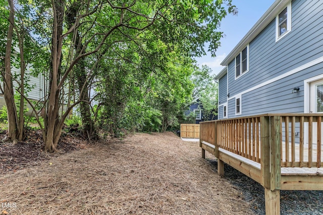 view of yard featuring a deck