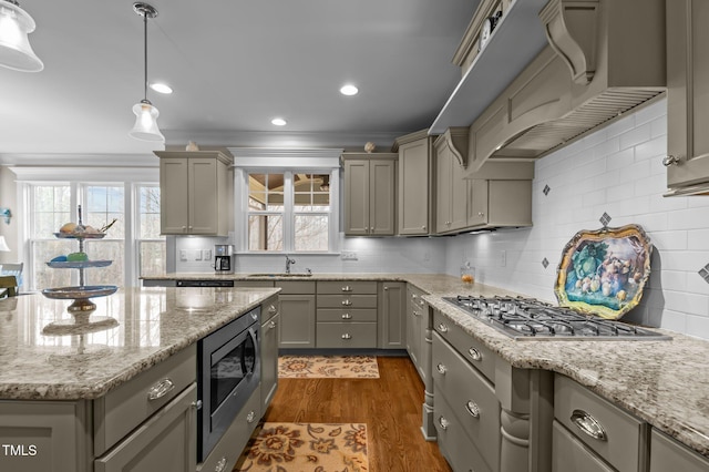 kitchen featuring premium range hood, gray cabinets, appliances with stainless steel finishes, and dark wood-type flooring