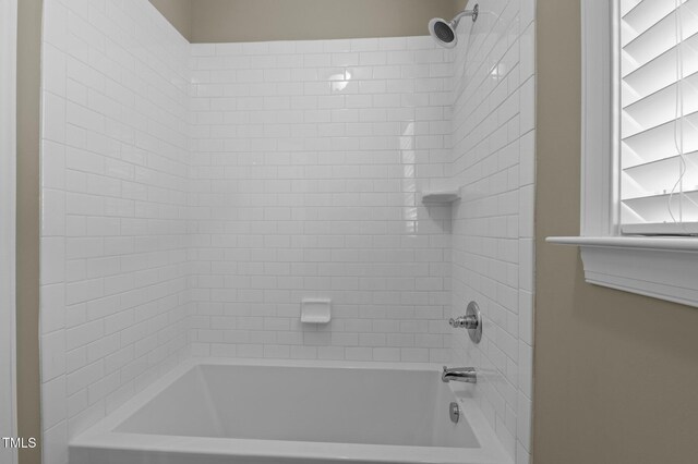 bathroom featuring bathtub / shower combination