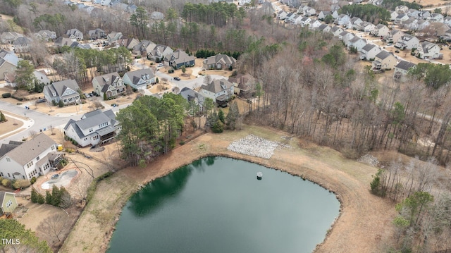 birds eye view of property with a residential view and a water view