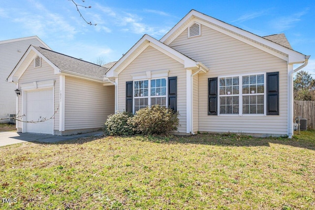 ranch-style house with central AC unit, an attached garage, a front lawn, and fence