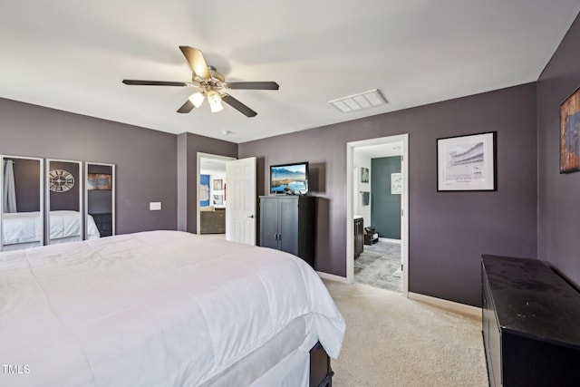 bedroom featuring ceiling fan, light colored carpet, visible vents, and baseboards