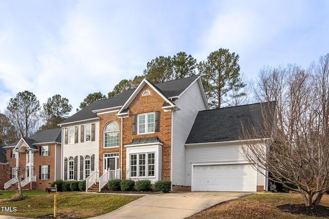 view of front of house featuring a garage, driveway, crawl space, and roof with shingles