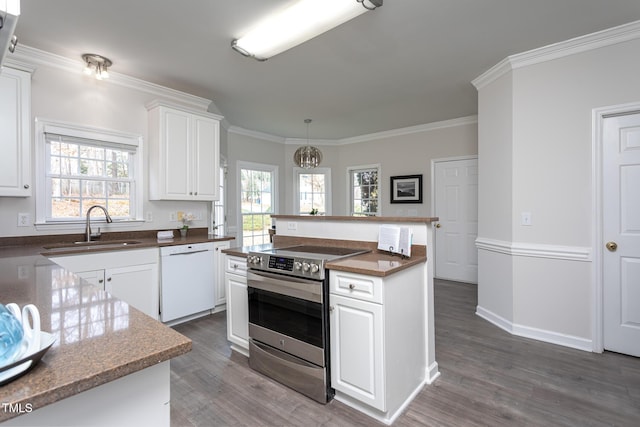 kitchen with white dishwasher, a sink, white cabinets, electric stove, and crown molding