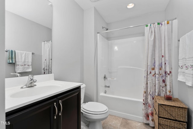 full bathroom featuring toilet, shower / bathtub combination with curtain, and vanity