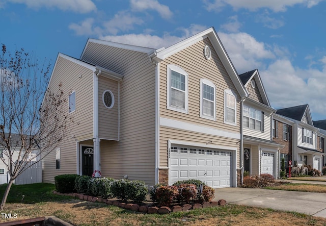 view of front of property with a garage and driveway