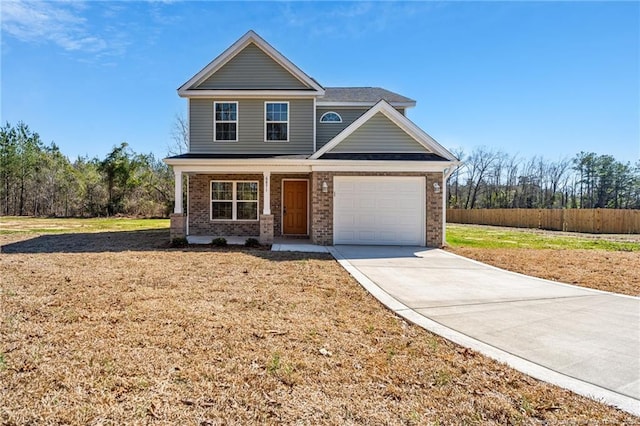 craftsman-style home featuring a porch, an attached garage, brick siding, concrete driveway, and a front lawn