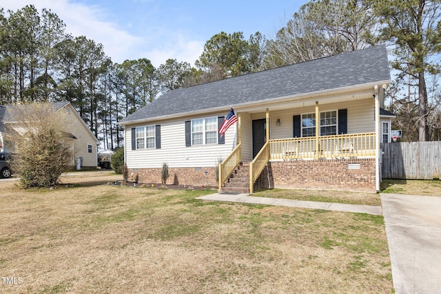 view of front of house featuring fence, roof with shingles, a porch, a front lawn, and crawl space