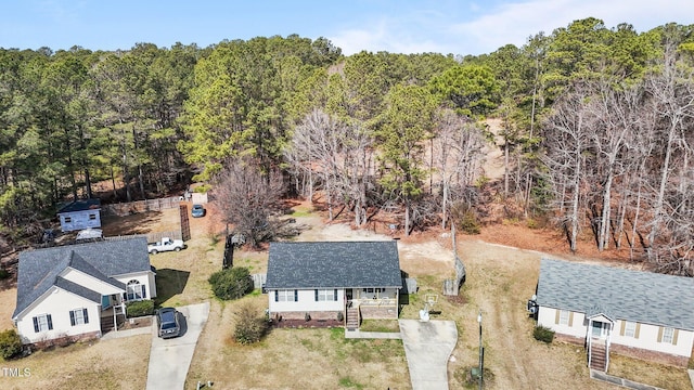 drone / aerial view with a forest view