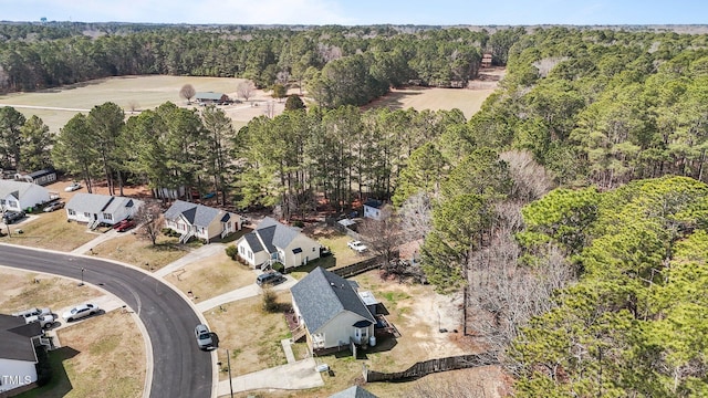 bird's eye view with a view of trees and a residential view