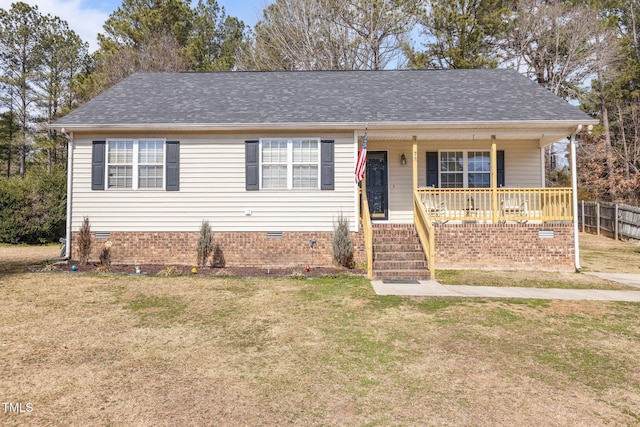 view of front of house with crawl space, a porch, a front lawn, and a shingled roof