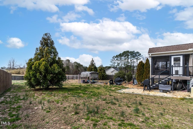 view of yard featuring fence