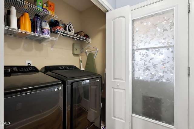 laundry room featuring laundry area and washing machine and clothes dryer