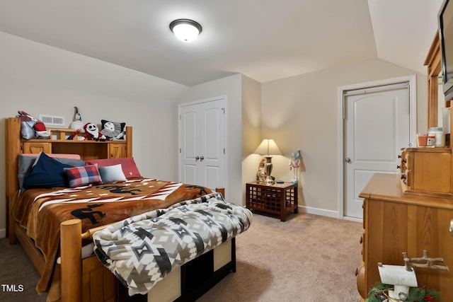 bedroom featuring light carpet, visible vents, baseboards, and vaulted ceiling