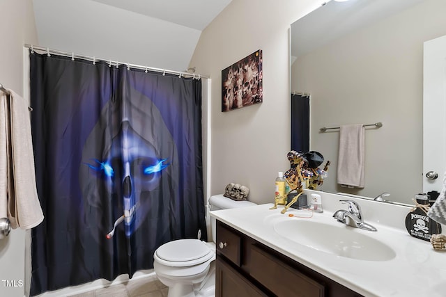 bathroom featuring a shower with shower curtain, toilet, and vanity