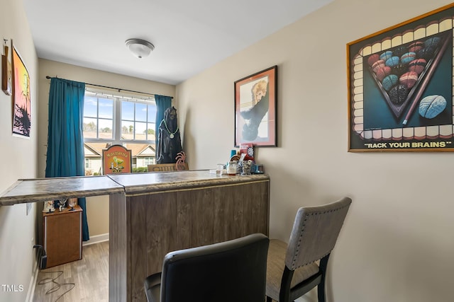 bar featuring wood finished floors