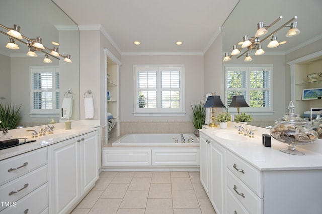 full bathroom with tile patterned flooring, crown molding, and a sink