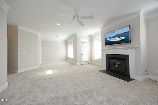 unfurnished living room with ornamental molding, carpet flooring, and a fireplace with flush hearth