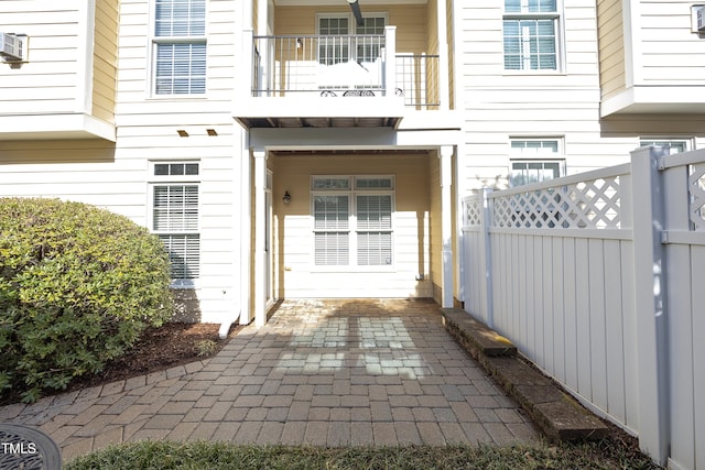 property entrance featuring fence