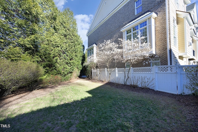 view of yard with fence