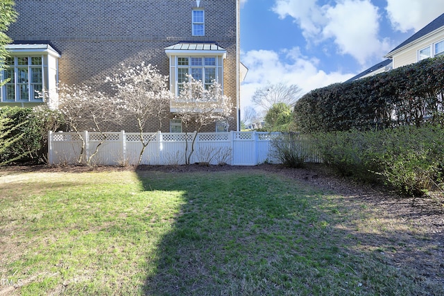 view of yard featuring fence