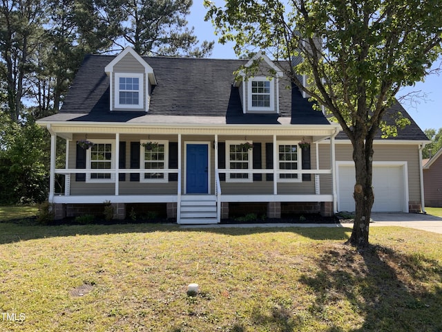 cape cod home with an attached garage, concrete driveway, a porch, and a front lawn