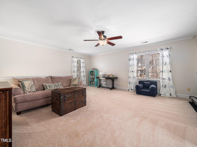 carpeted living room featuring visible vents, baseboards, ceiling fan, and crown molding