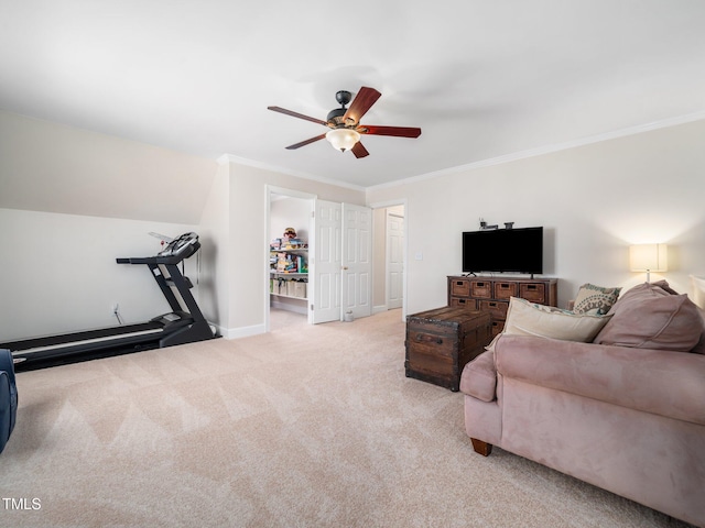 living area featuring crown molding, baseboards, carpet, lofted ceiling, and a ceiling fan