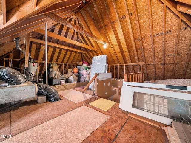 unfinished attic with an upstairs landing and water heater