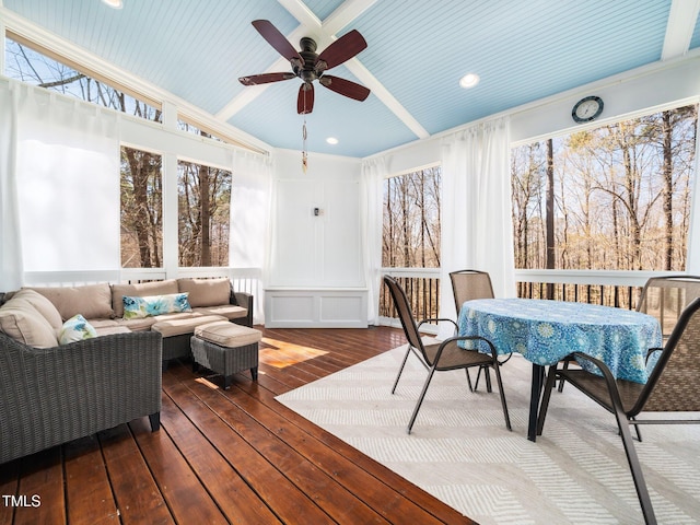 exterior space featuring a wealth of natural light, a sunroom, ceiling fan, and wood-type flooring