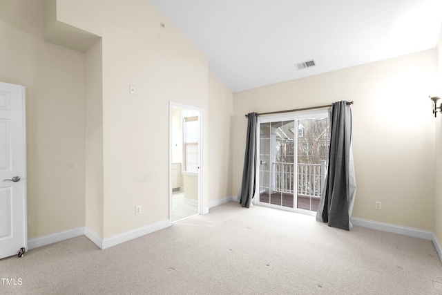 unfurnished bedroom with access to exterior, baseboards, visible vents, and carpet flooring