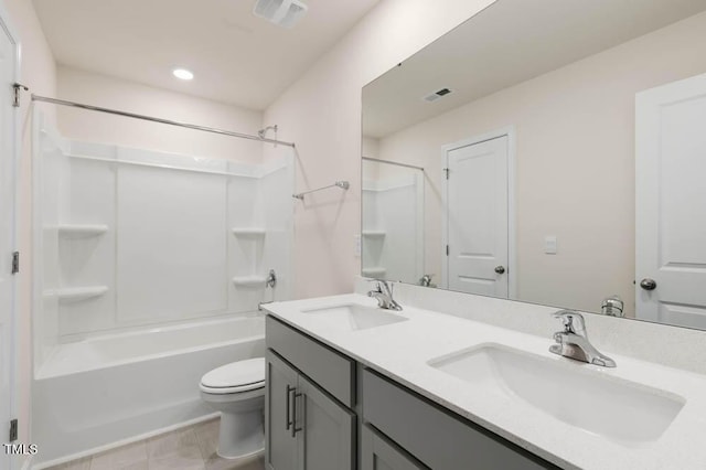 full bath featuring toilet, a sink, and visible vents