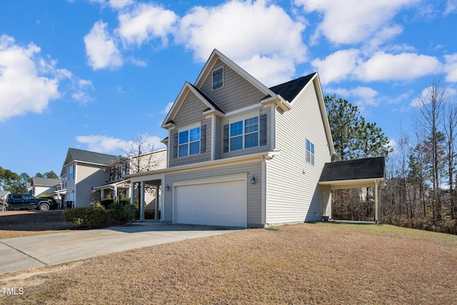 view of front of property featuring a garage and driveway