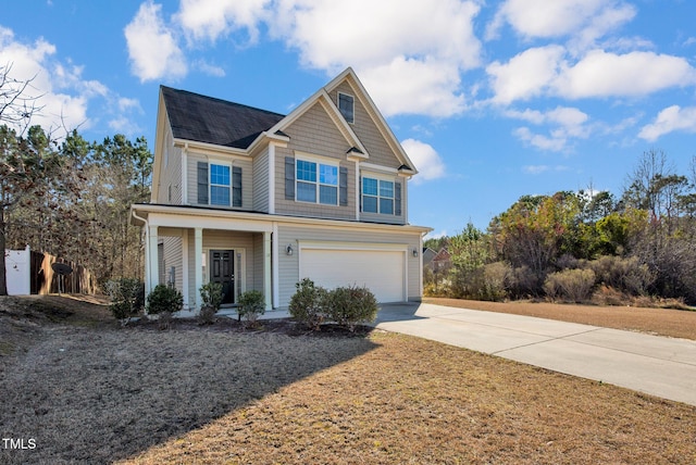 view of front facade with a garage, covered porch, and concrete driveway